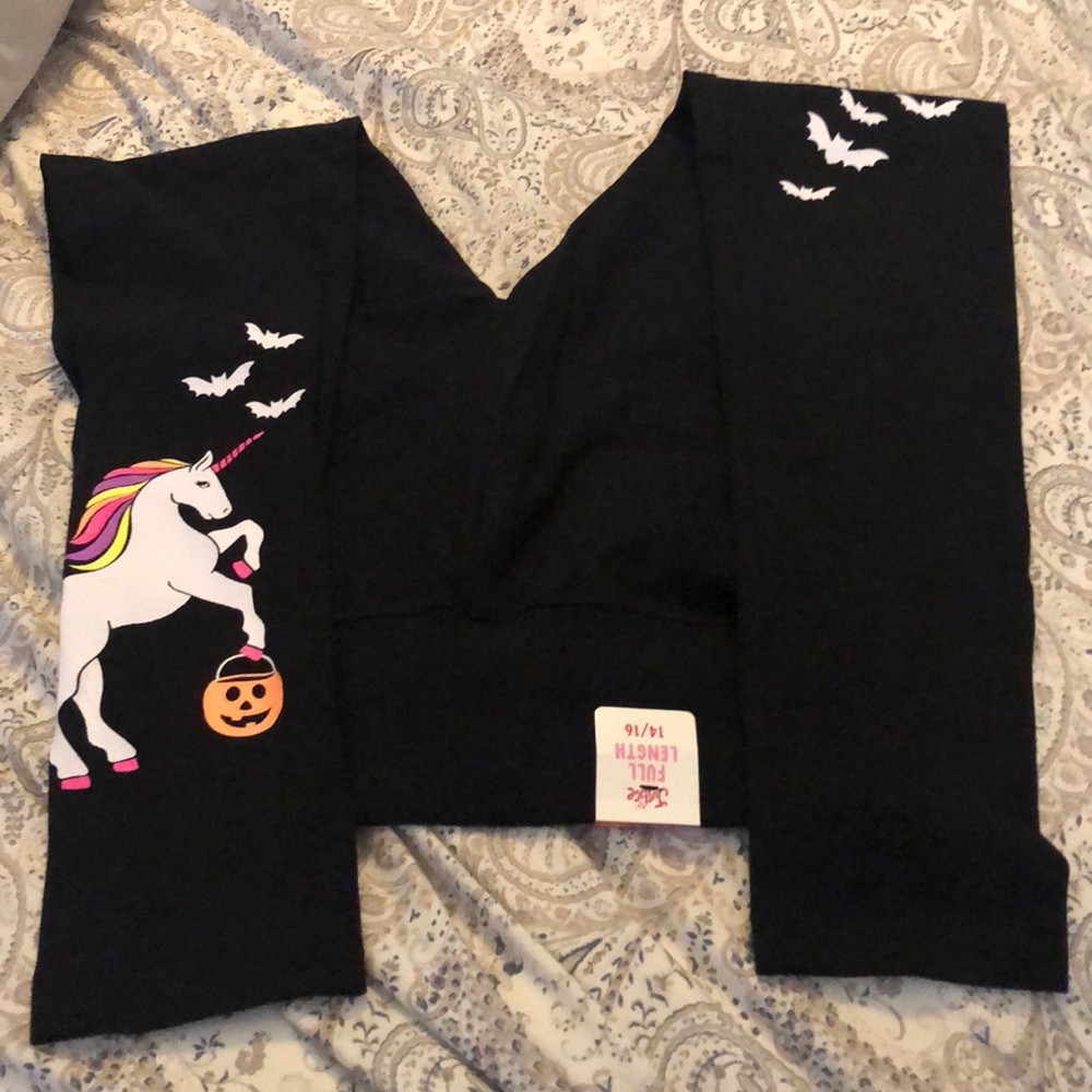 NWT justice unicorn Halloween leggings.